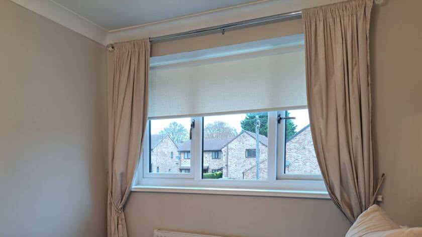 Fitted roller blinds in a bedroom in Knottingley